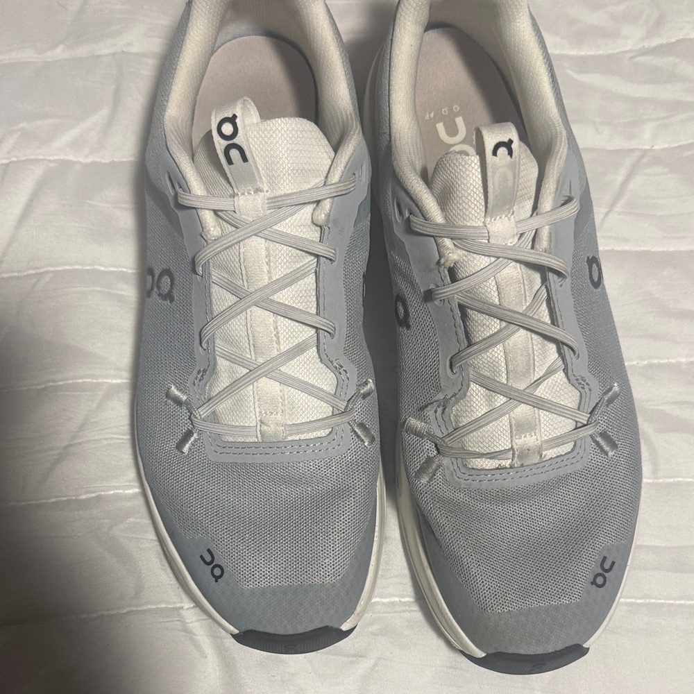 On Running Light Gray and White Athletic Shoes